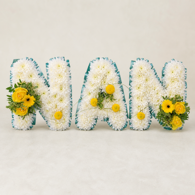 NAN Yellow & White Funeral Letter Tribute | Slough - Handcrafted NAN funeral letter tribute in yellow and white, created by Four Seasons Florist in Slough. Contact us about colours and delivery timing.