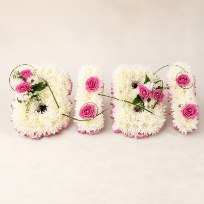 Personalised Pink & White Letter Tribute | Slough - Personalised pink and white funeral letter tribute, handcrafted by Four Seasons Florist in Slough. Contact us about lettering and delivery timing.