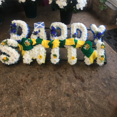 Blue & Yellow Personalised Letter Tribute - Blue and yellow personalised letter tribute handcrafted to spell a name or message, with the option to add flags, scarves and special requested items. PRICING PER LETTER