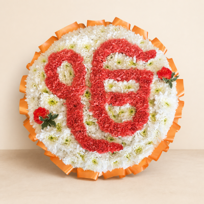 Ik Onkar Funeral Tribute | Sikh Flowers in Slough - Handcrafted Ik Onkar funeral tribute for Sikh services and memorials, created in white and orange by Four Seasons Florist in Slough.